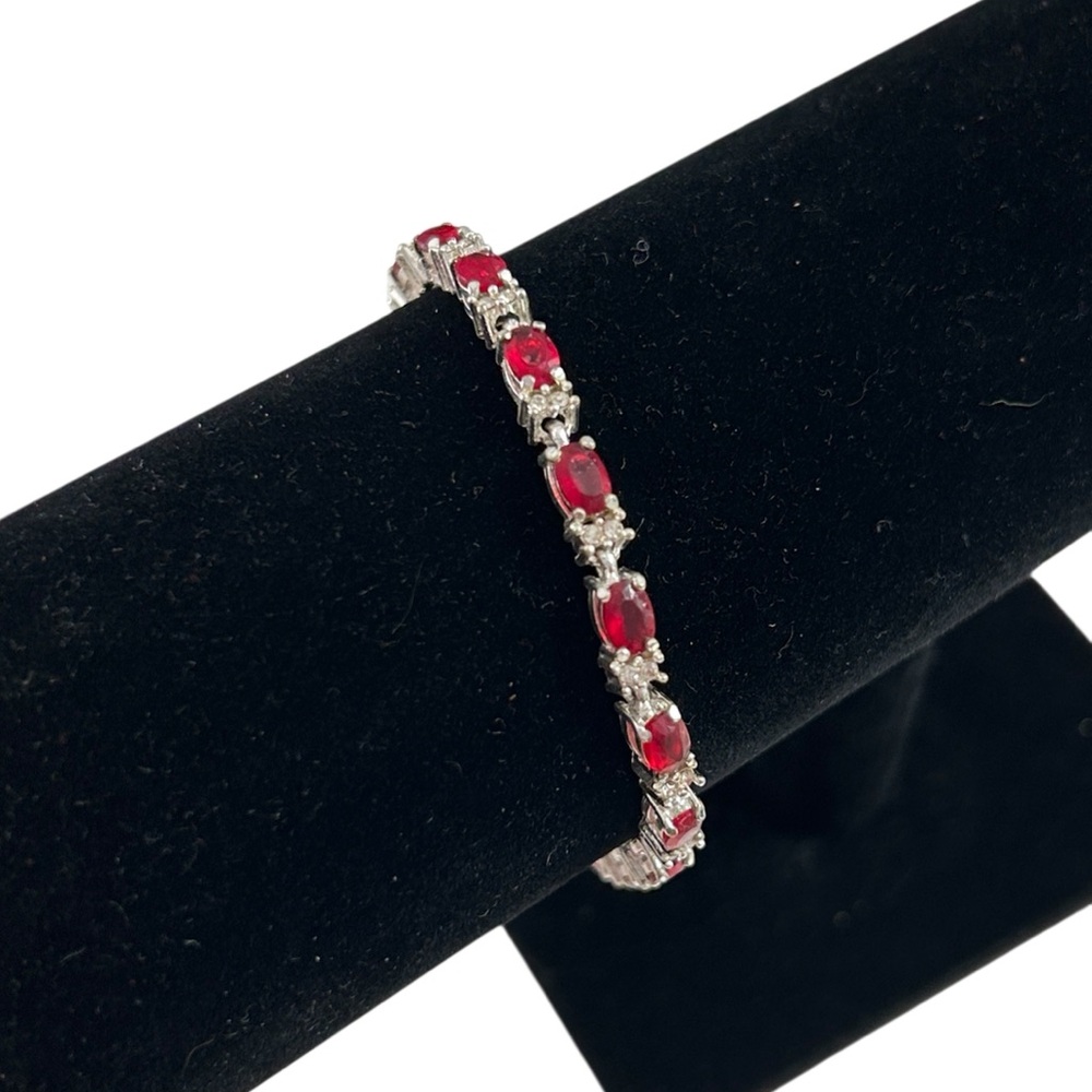 Avon 7.5” Red Ruby Colored Rhinestone Silver Tone Tennis Bracelet Vintage